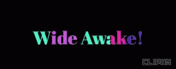 a purple and black color blocker that says wide awake