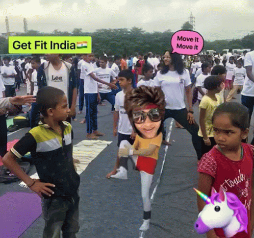 the child is holding the sign to get fit india