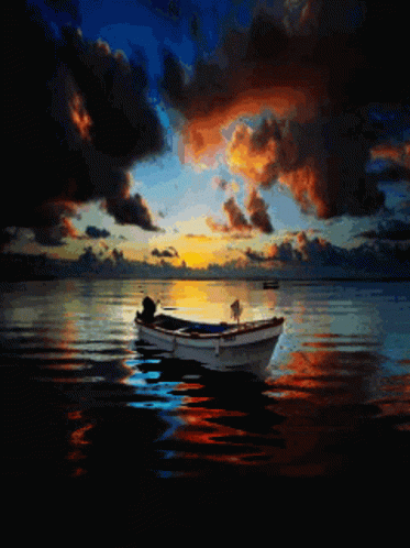 a boat on water with clouds and lights in the sky
