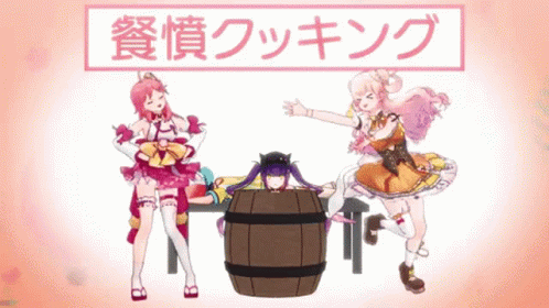 three women dressed in anime characters pose around a barrel