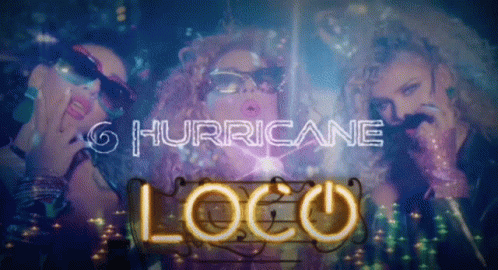 the logo for hurricane loco, written on a wall with two women in front