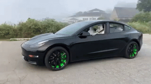 a car with green rims on it