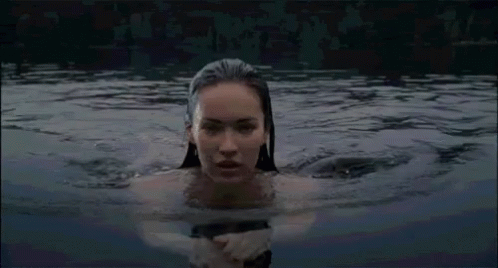 a person floating in water with water around them
