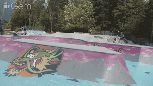 a skateboard park with purple and yellow colors