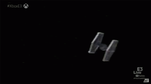 two rockets in space in the dark with one being visible