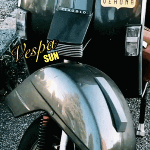 an old style motorcycle with a large side view mirror
