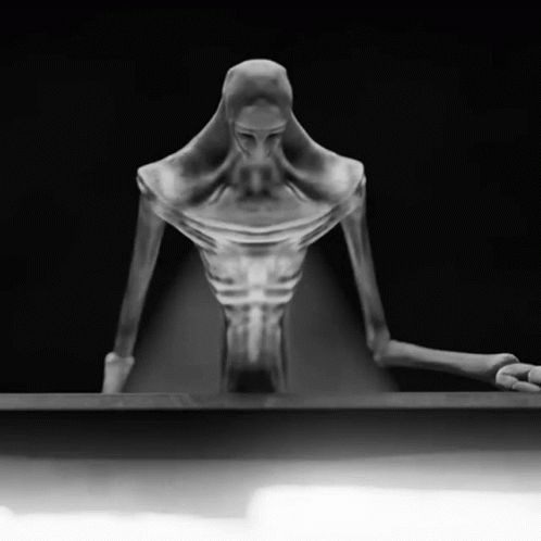 an x - ray po of a woman looking down and kneeling down