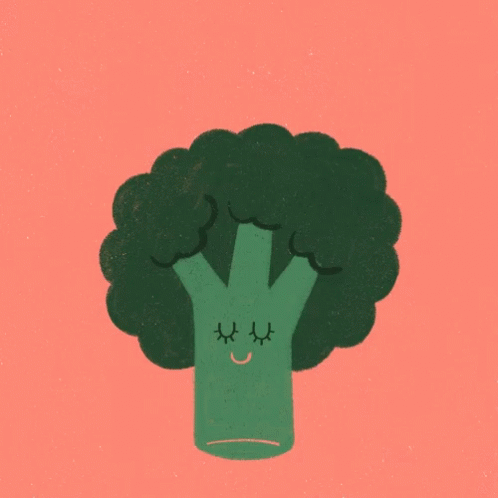 a green broccoli face has been drawn on