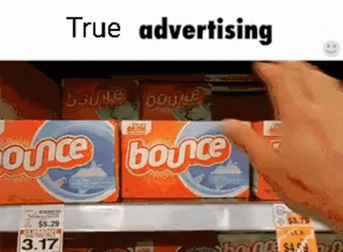 a person selecting a box of bounce from a display
