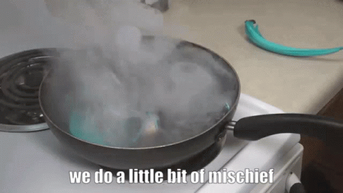 a frying pan is cooking a dish on the stove