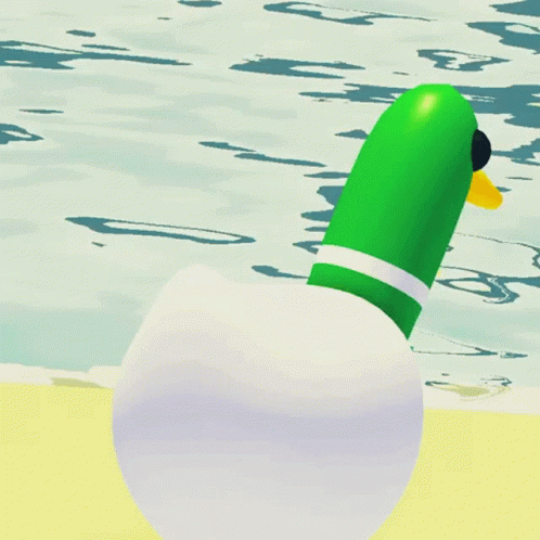 a green and white floating toy is in the water