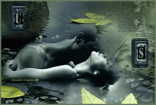 a woman laying on a bed in the water