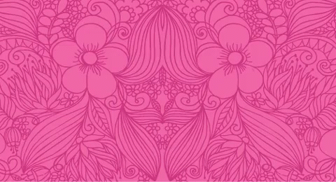 a purple wallpaper with flowers on it