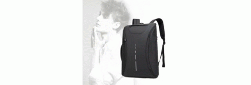 a black backpack is hanging up against a wall