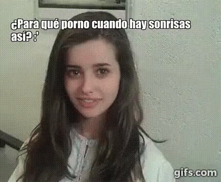 a young woman with long hair is smiling in a video call
