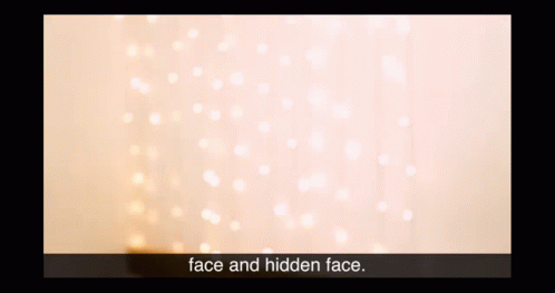 there is a white curtain and a blue background with the words face and hidden face