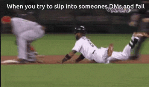 baseball player sliding onto home plate and another person holding a bat on the field
