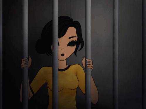 a person looking out of behind bars as they look at soing