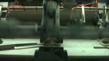 many machines spinning metal pieces in different directions