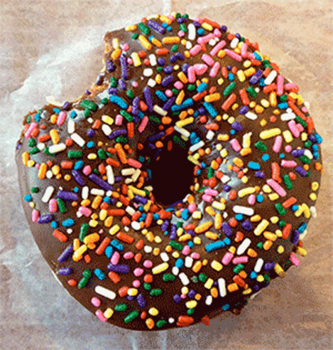 the sprinkled donut is black with sprinkles