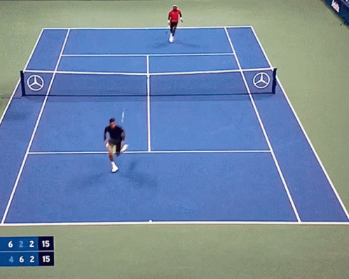 two men are playing tennis in a virtual world