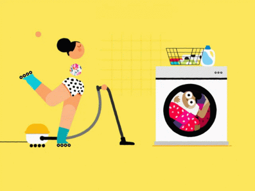 man in pajamas cleaning clothes out of his washing machine