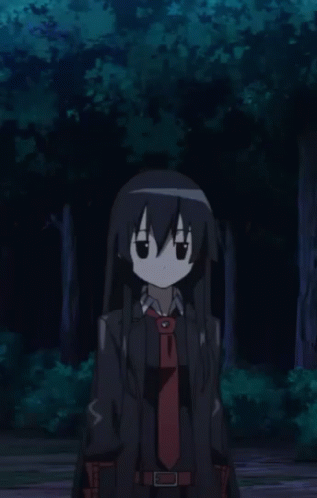 an anime girl wearing a coat and tie in a park