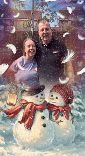 an image of two people next to a snowman
