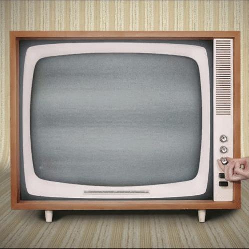 a close up of a small tv with an arrow