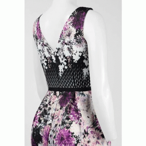 a black and white floral dress on a mannequin