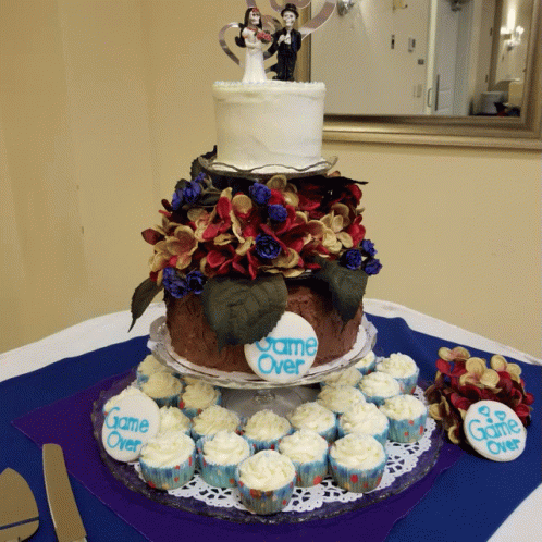 a decorated cake sitting on top of a table