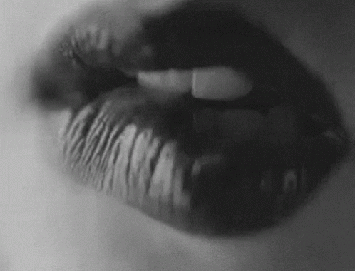 black and white pograph of a person's lips