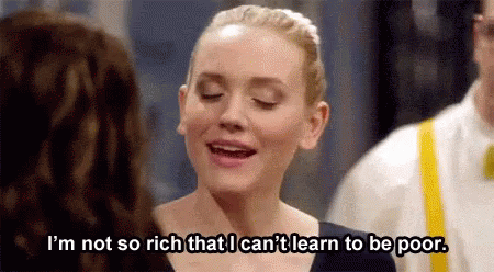 a person with the words i'm not so rich that i can learn to be poor