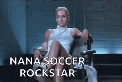 a female soccer player in tights sits in a chair