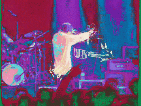 this is an image of concert scene, with the performer in white