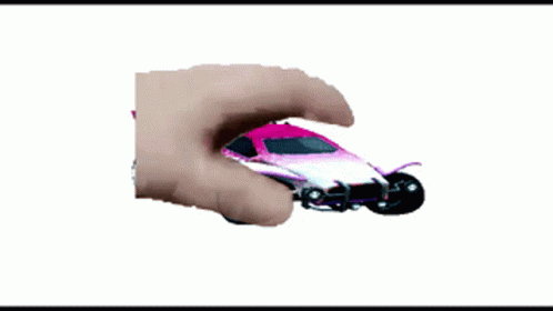 a hand is holding onto the toy car