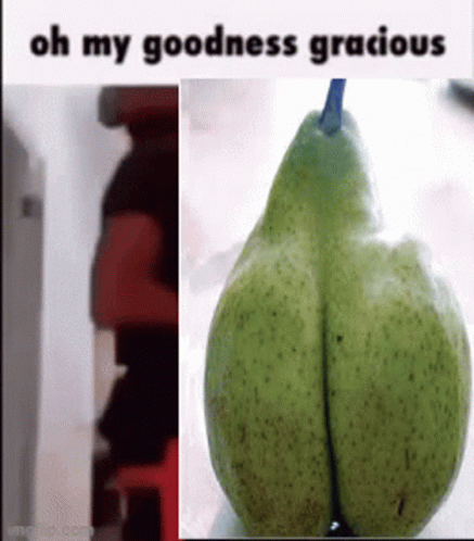 a green pear, a black and white po, and some words on the back