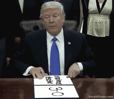 trump signs a speech at the white house on the floor