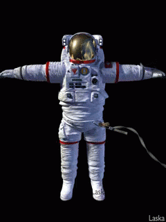 an astronaut standing and posing for the camera
