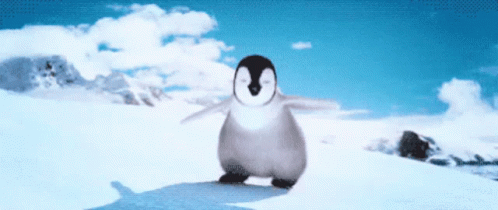 an image of a penguin on top of a snowy hill