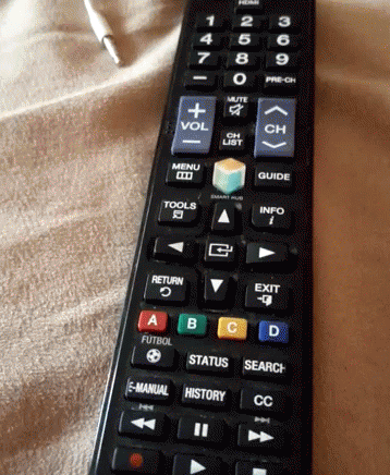 the remote control has many different colorful letters on it