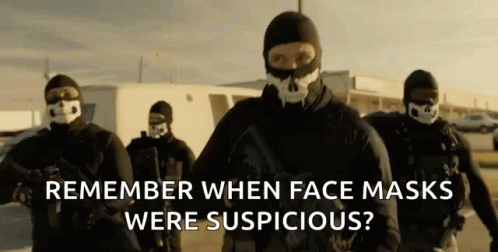 a number of people wearing snow skis with a background of the words, remember when face masks were suspicious