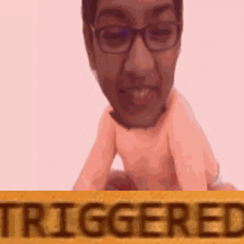 a cartoon avatar with glasses has the word triggered