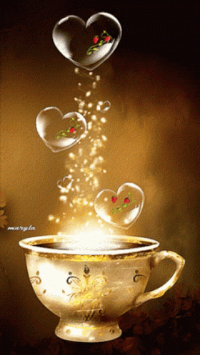 a heart shaped water drop falling out of a teacup