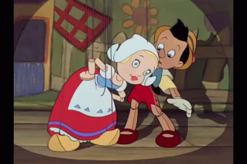 an animated scene with a young blue - skinned character and an older white character