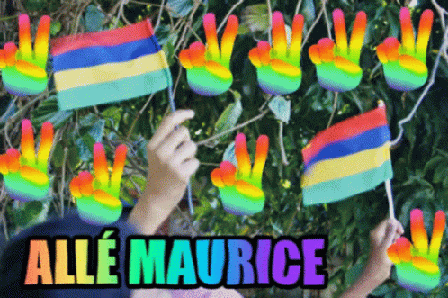 a man holding a pair of rainbow colored paper flags