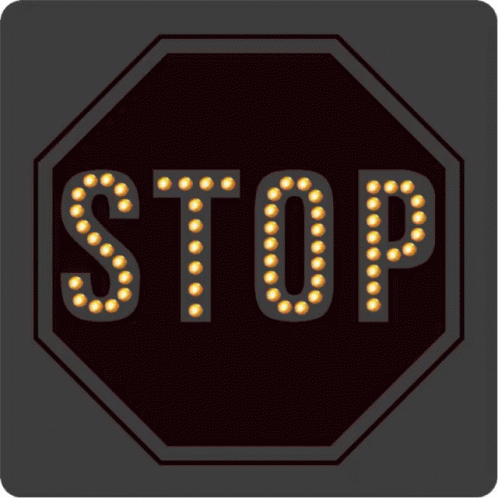 stop sign with blue lights and black background