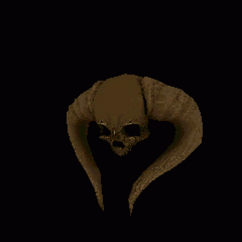 a dark, grimly skull is posed in the dark