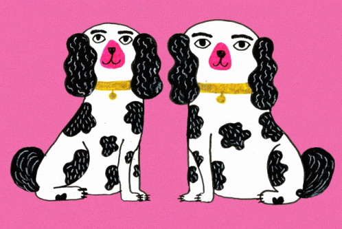 two dogs that are on purple paper, sitting on each other