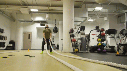 two men doing exercise in the gym